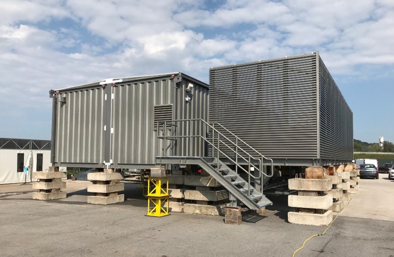 a picture of Japan’s first modular data center delivered by PDFM, featuring a Smart Mod server unit and separate utility module.
