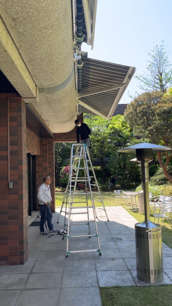 Workers of PDFM maintaining Swiss embassy's official residence garden