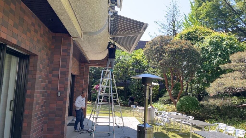 Workers of PDFM maintaining Swiss embassy's official residence garden