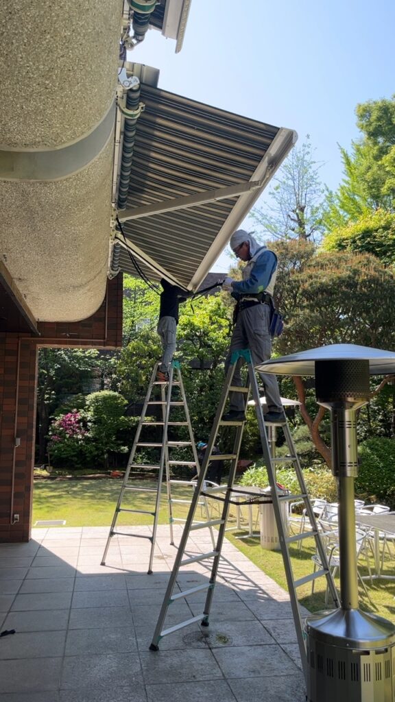 Workers of PDFM maintaining Swiss embassy's official residence garden