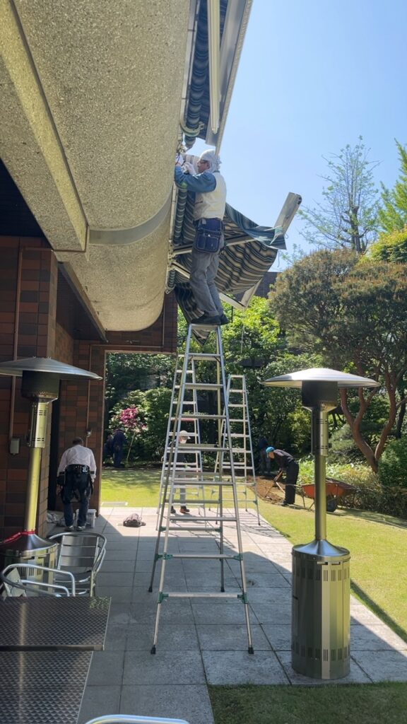 Workers of PDFM maintaining Swiss embassy's official residence garden