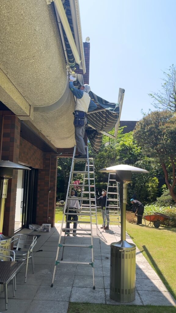 Workers of PDFM maintaining Swiss embassy's official residence garden