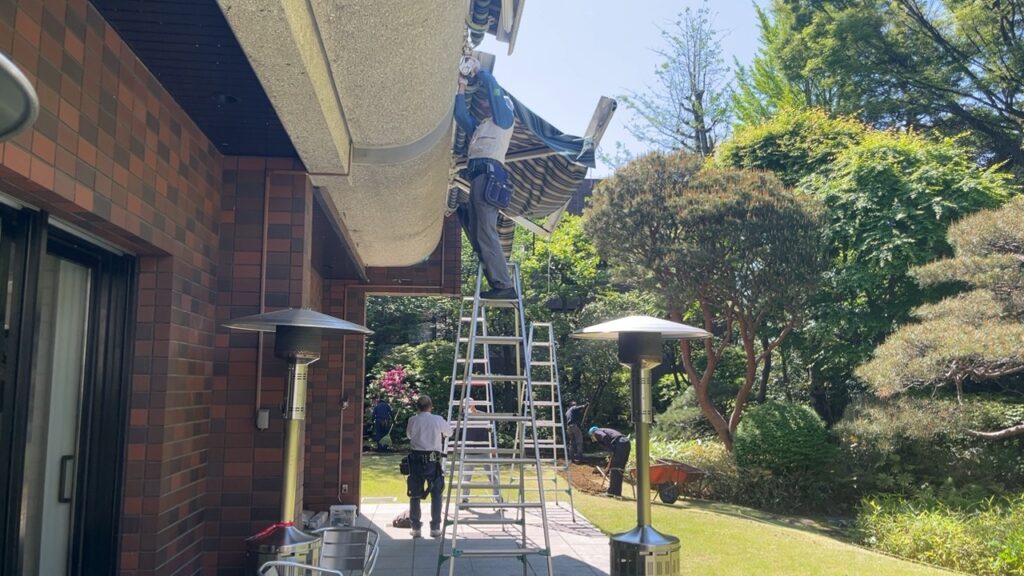 Workers of PDFM maintaining Swiss embassy's official residence garden