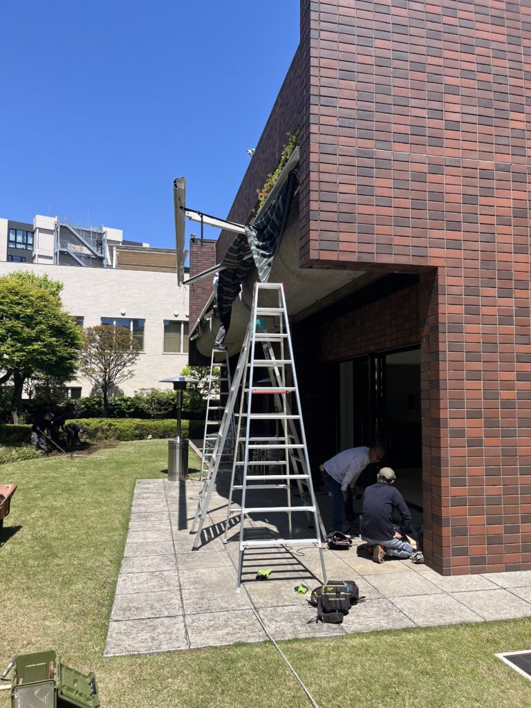 Workers of PDFM maintaining Swiss embassy's official residence garden