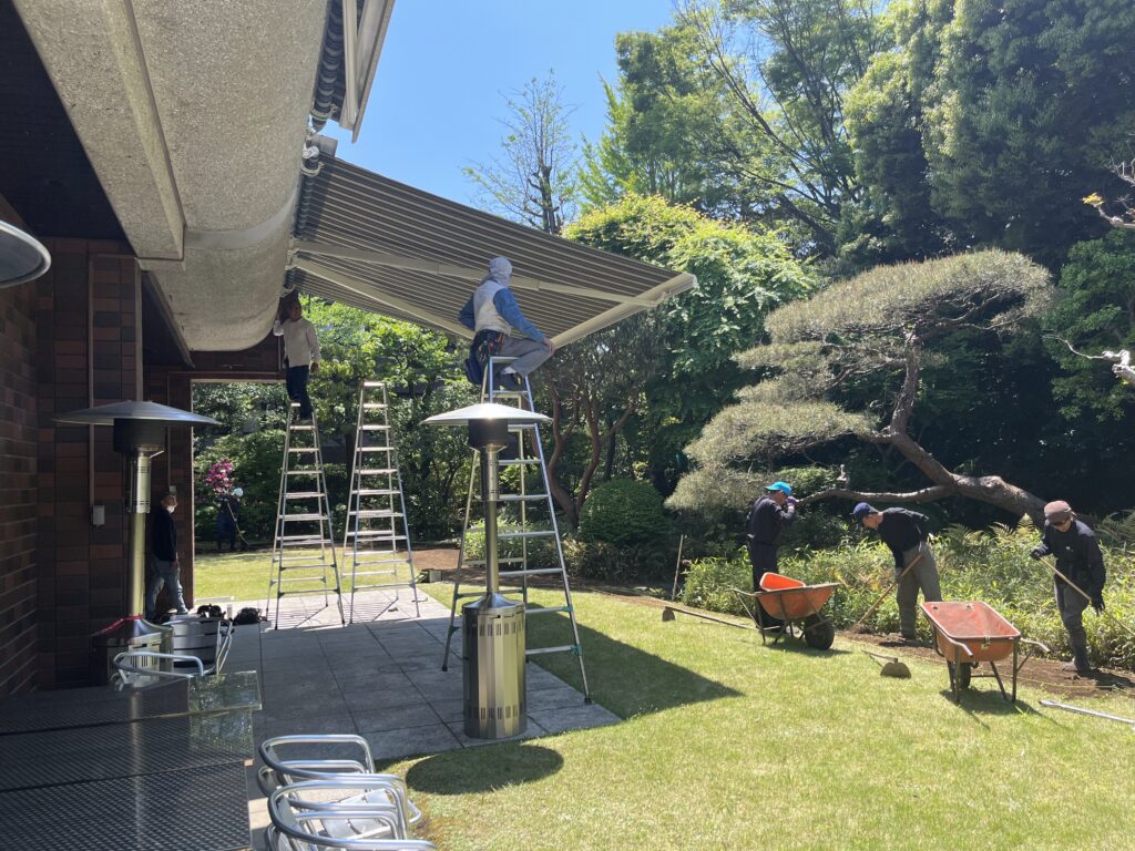 Workers of PDFM maintaining Swiss embassy's official residence garden