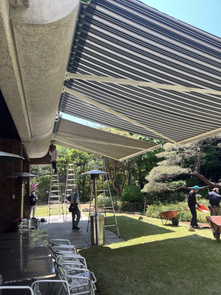 Workers of PDFM maintaining Swiss embassy's official residence garden