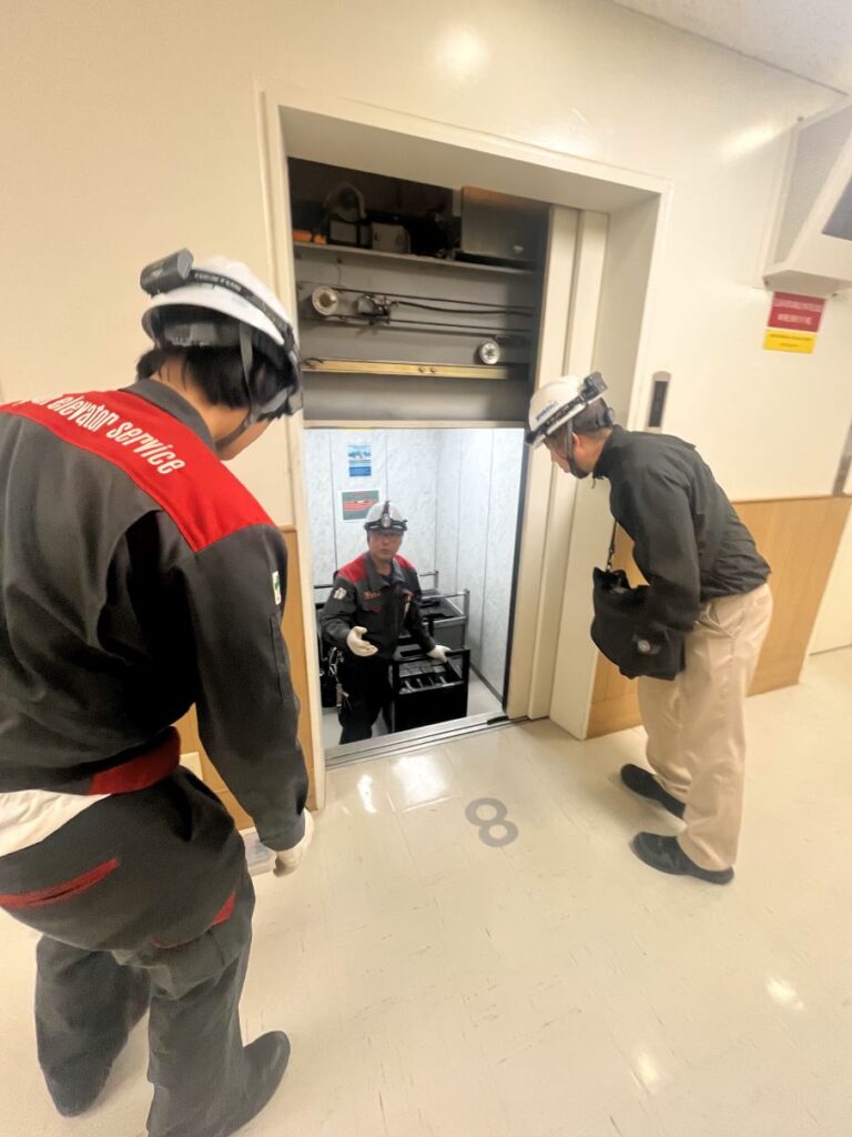 PDFM workers maintaining and repairing Vertical Transportation Equipment (VTE - Elevator) Systems