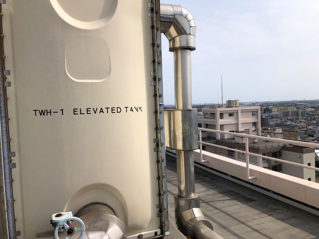 An image of an elevated tank of buildings and incidental facilities in the U.S. Navy Air Facility Atsugi managed by PDFM