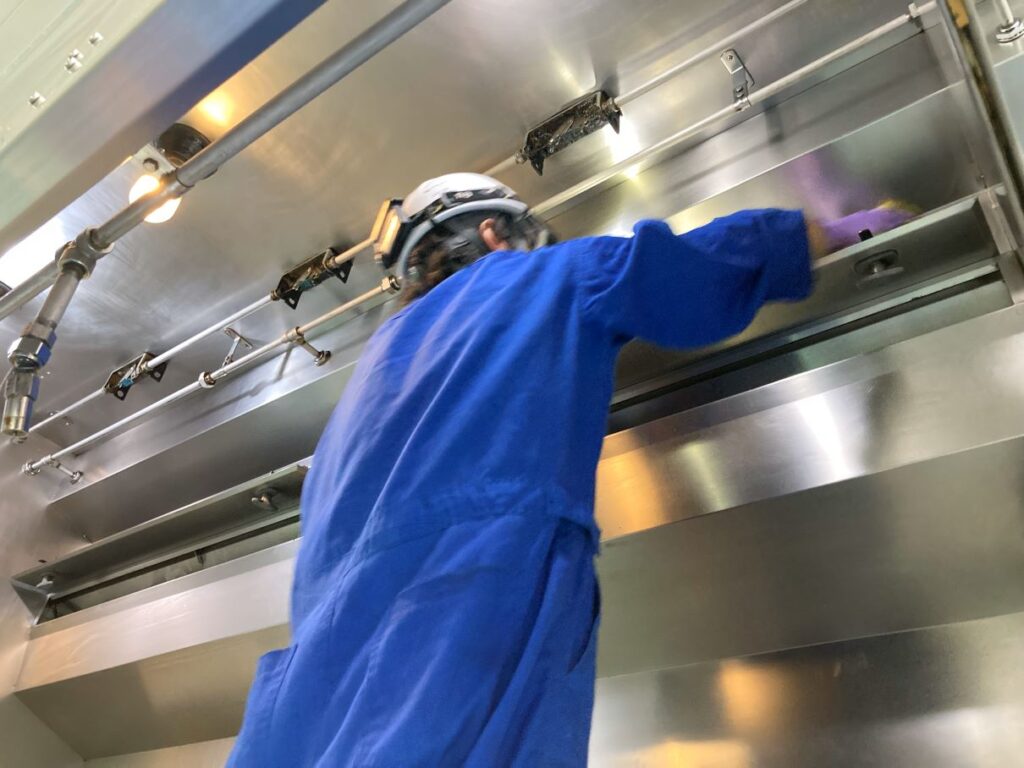 PDFM WorkerCleaning a Kitchen Hood of Galley at various facilities in the U.S. Army Camp Zama, Sagami General Depot, Sagamihara Family Housing Area