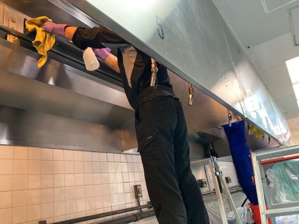 PDFM WorkerCleaning a Kitchen Hood of Galley at various facilities in the U.S. Army Camp Zama, Sagami General Depot, Sagamihara Family Housing Area