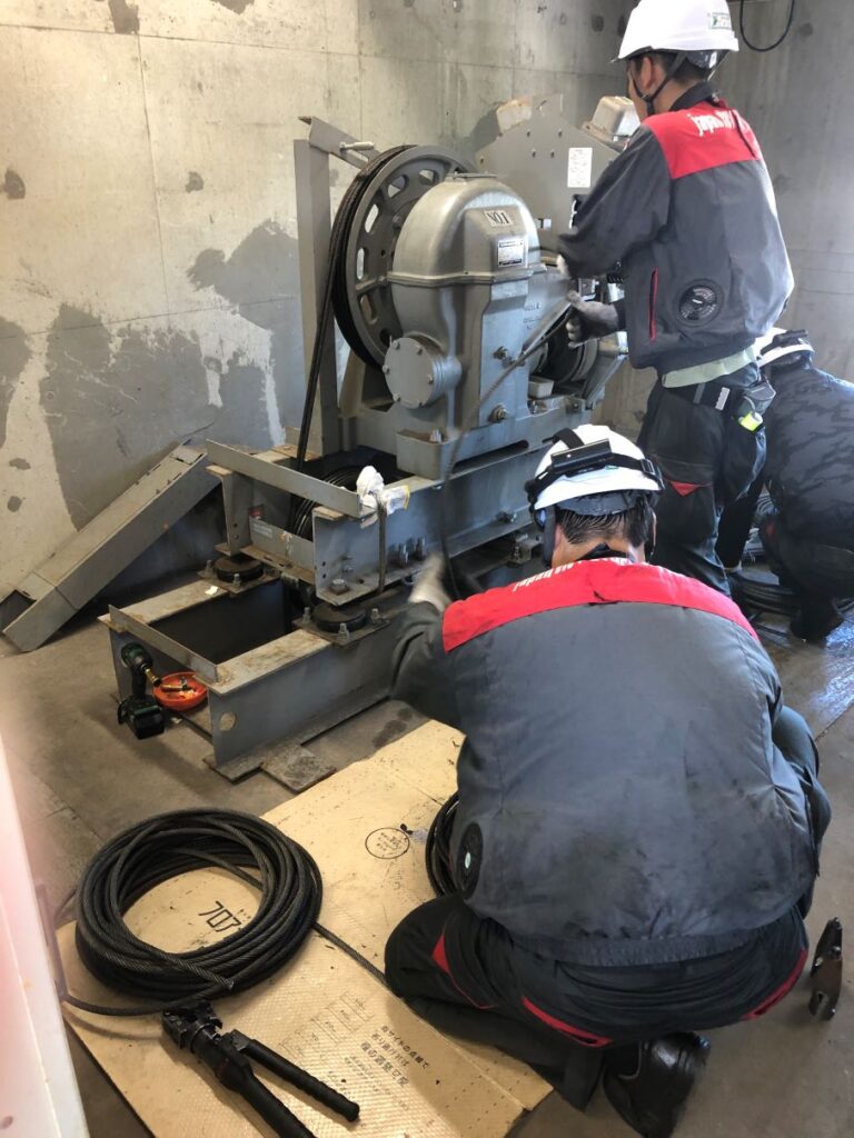 PDFM workers maintaining and repairing Vertical Transportation Equipment (VTE - Elevator) Systems